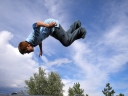 Boy flipping on a trampoline. Photograph by David Schauer