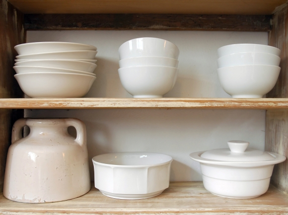 Crockery on shelves. Photograph by Dominic Morel